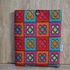 20260416_182059 “Funda de libro con diseño Panot, la flor icónica de Barcelona, inspirada en las baldosas modernistas de la ciudad”