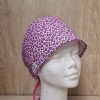 Gorro quirúrgico reutilizable animal print fucsia hecho a mano en algodón 100%, cómodo, transpirable y ajustable para profesionales sanitarios.